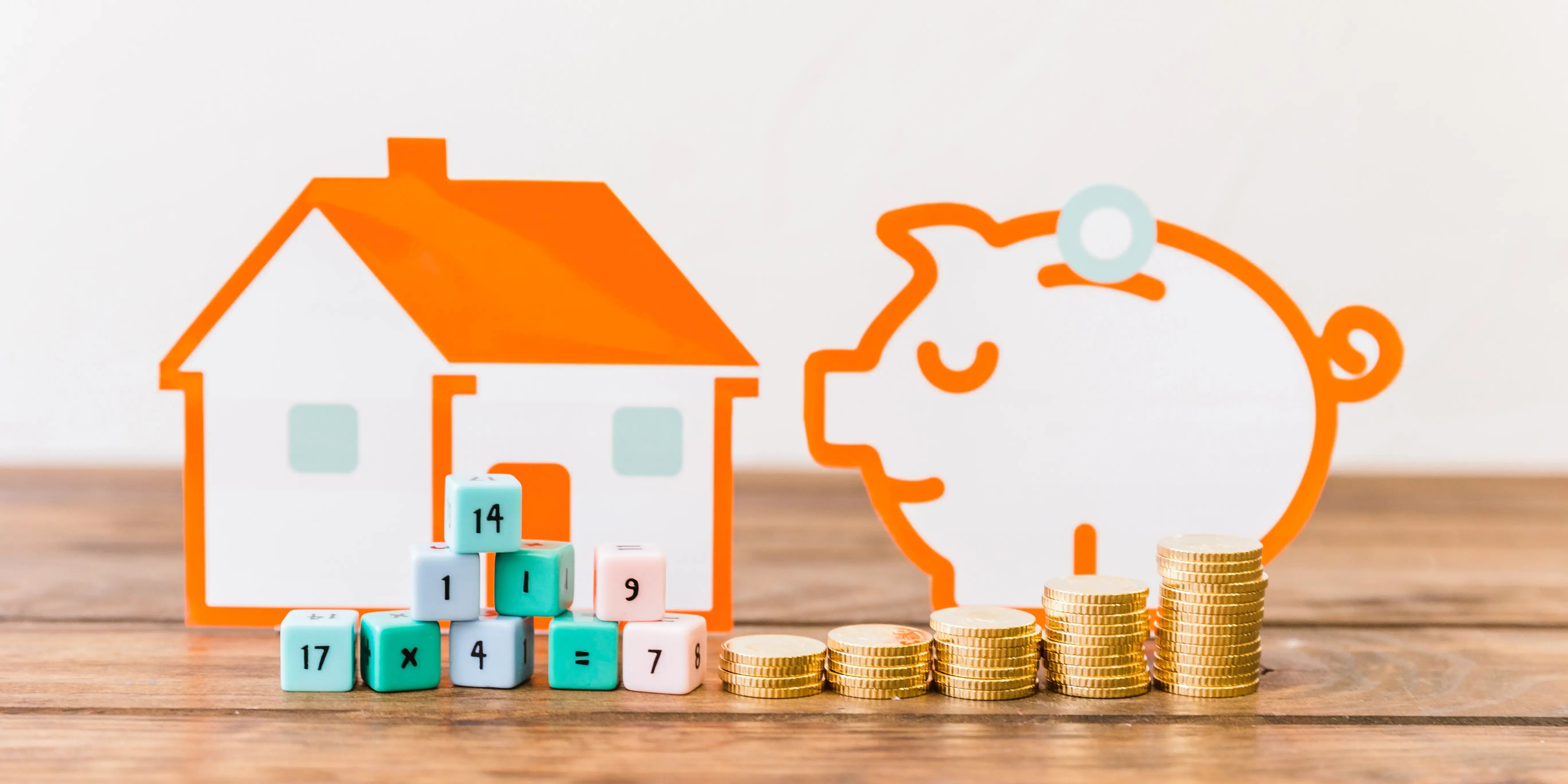 Casa, dinero y alcancía. Invertir en una casa durante la incertidumbre económica