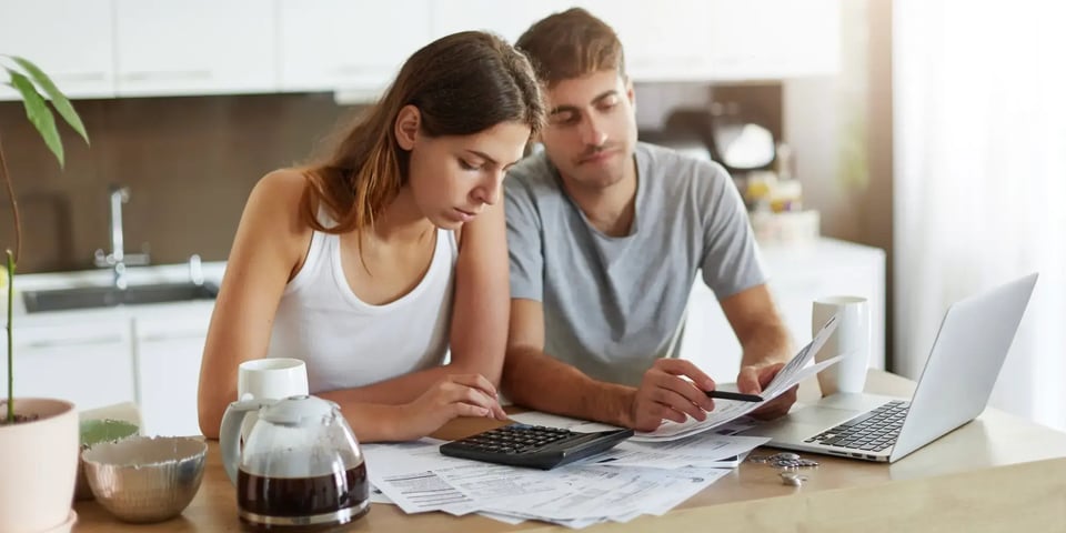 young-couple-checking-their-family-budget